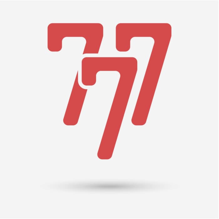 The number 777 in red modern font numbers with the middle number being slightly lower than the other two.