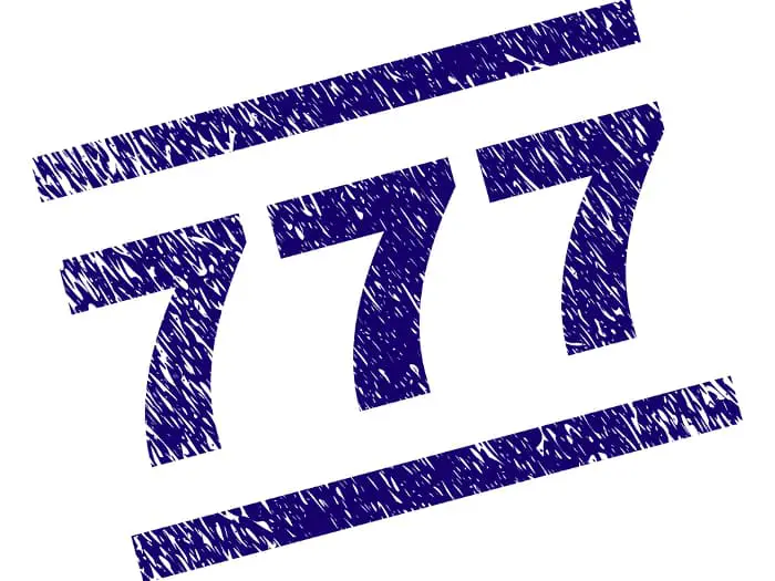 An image of the number 777 that looks like it has been stamped in blue ink.