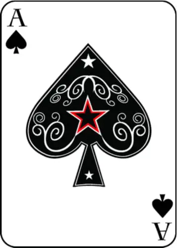 A black and white image of an ace of spades playing card with a red-accented star and other decorative detailing on the spade.