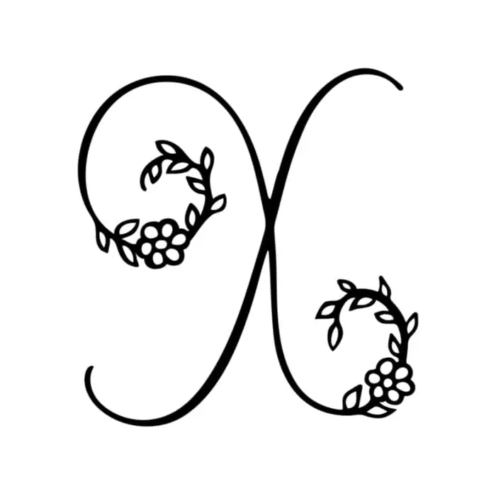 A black and white image of a simple, curved X with floral details.