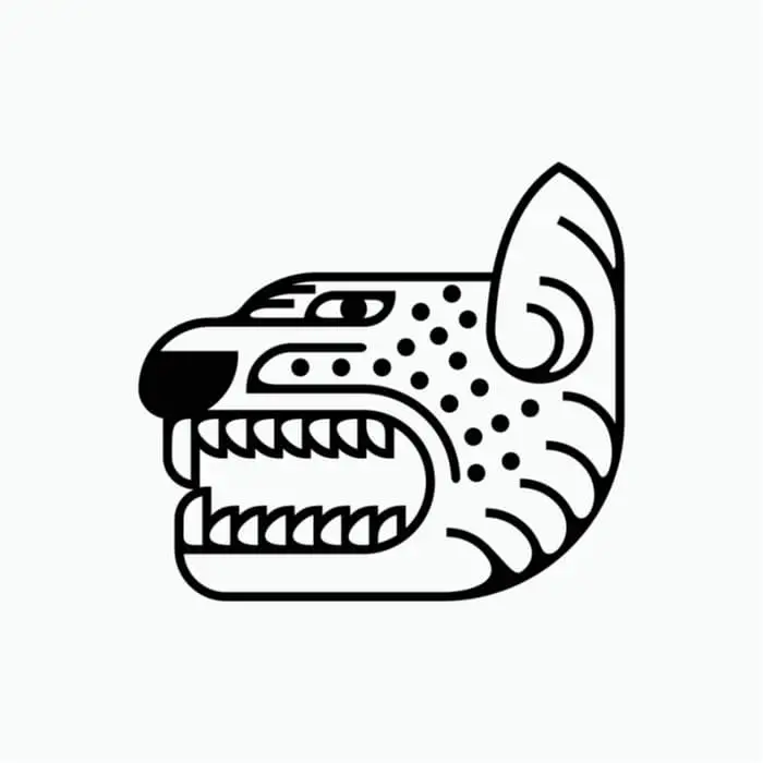 A primitive black and white image of a jaguar head.