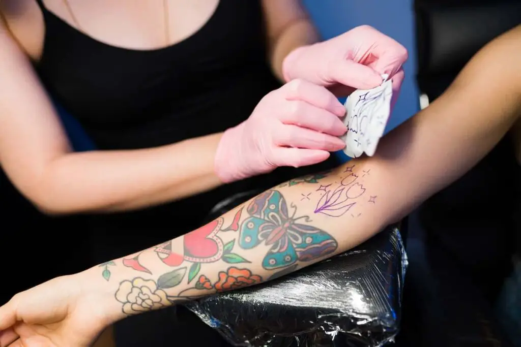 A tattoo transferred onto skin from tattoo stencil paper. 