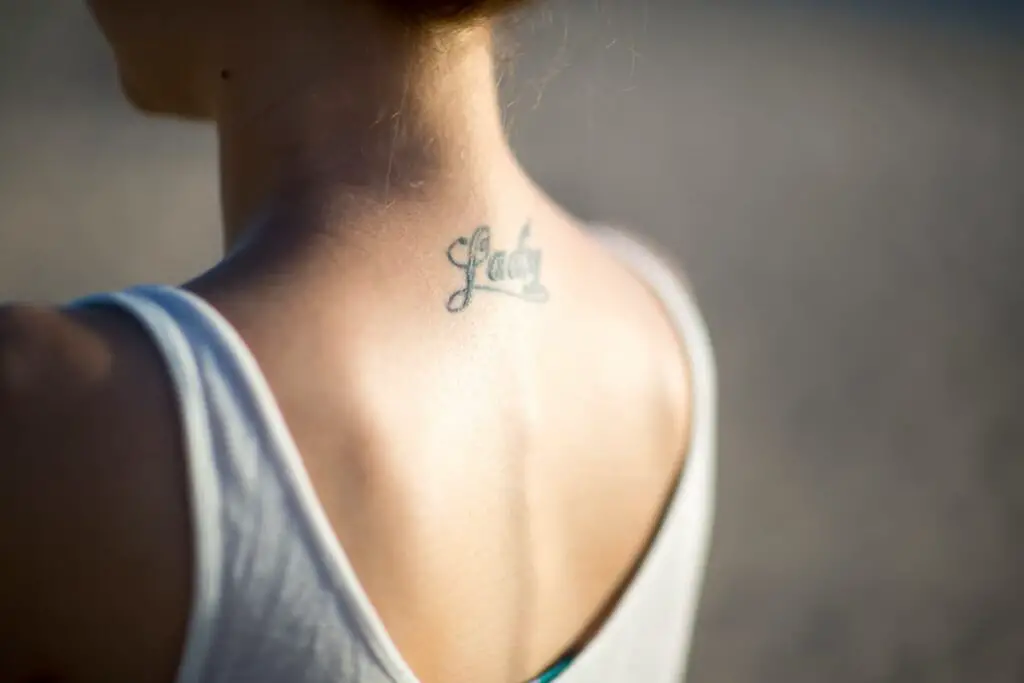 Tattoo on a woman's upper back.